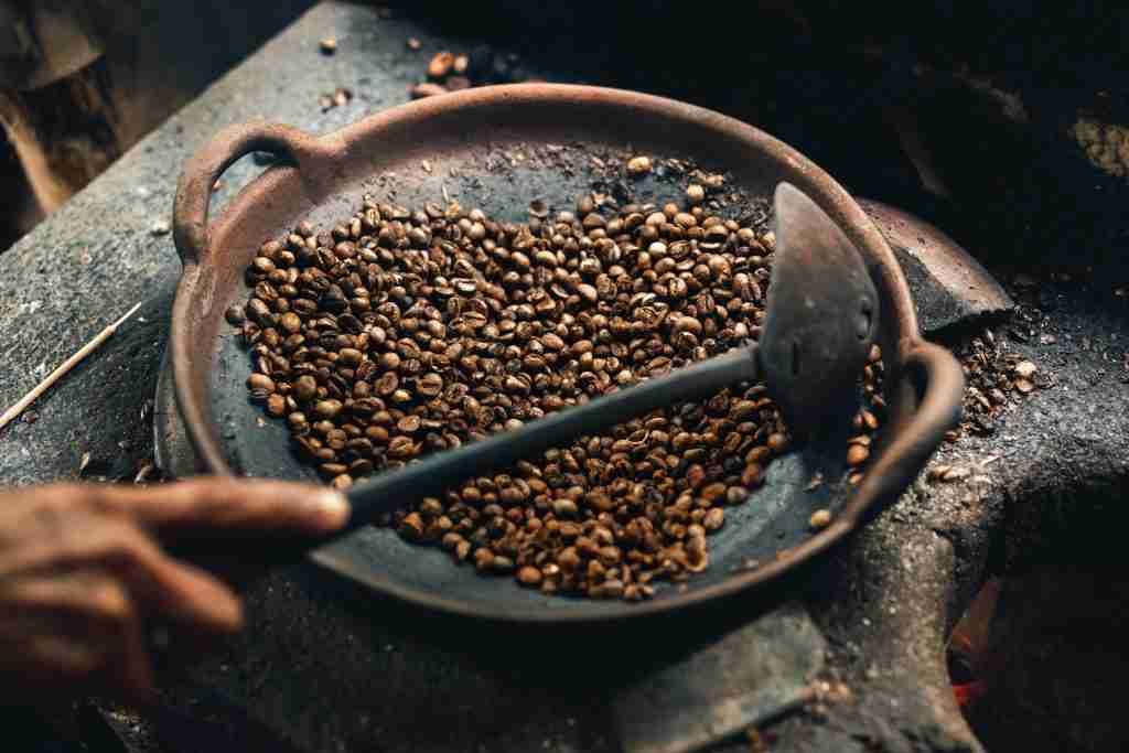 How to Roast Coffee Beans at Home 1 coffee beans on round wok 2711959
