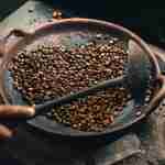 coffee beans on round wok 2711959