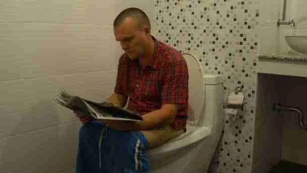 Why Does Coffee Make You Poop? 1 depositphotos 201971452 stock video a man sitting on the